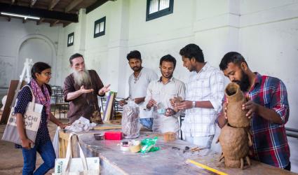 KMB- Artist Valsan Koorma Kolleri (second from left) giving directions to the participants